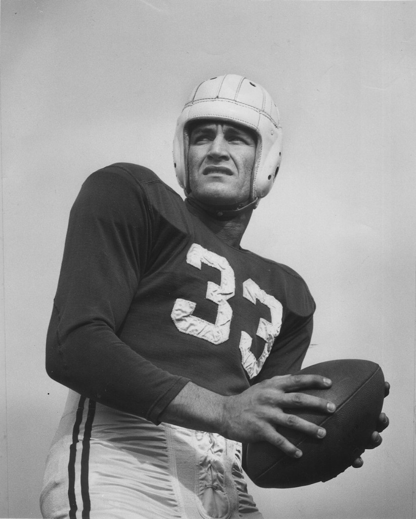 Harry Agganis in football uniform