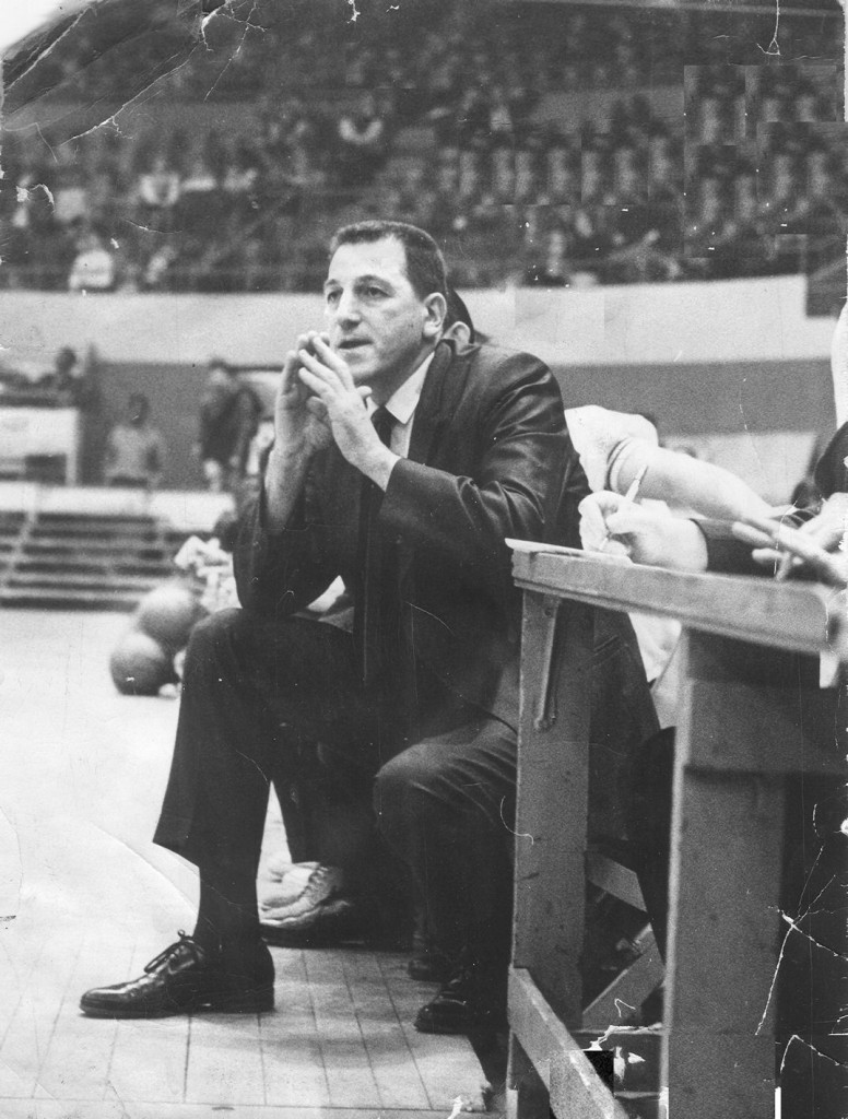 Herb Brenner coaches the Lynn Classical basketball team in a game at Boston Garden.